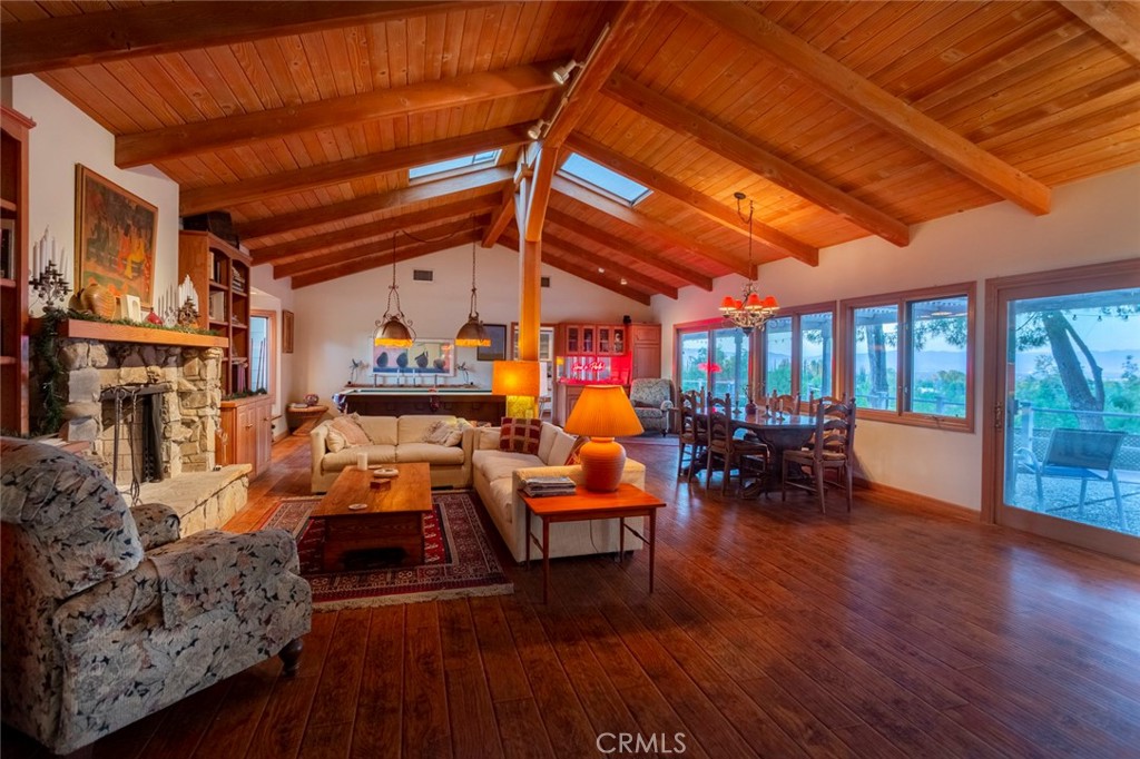5798 Penland Road Hidden Hills, CA 91302 - Photo 4 of 13 a living room with furniture and a fireplace