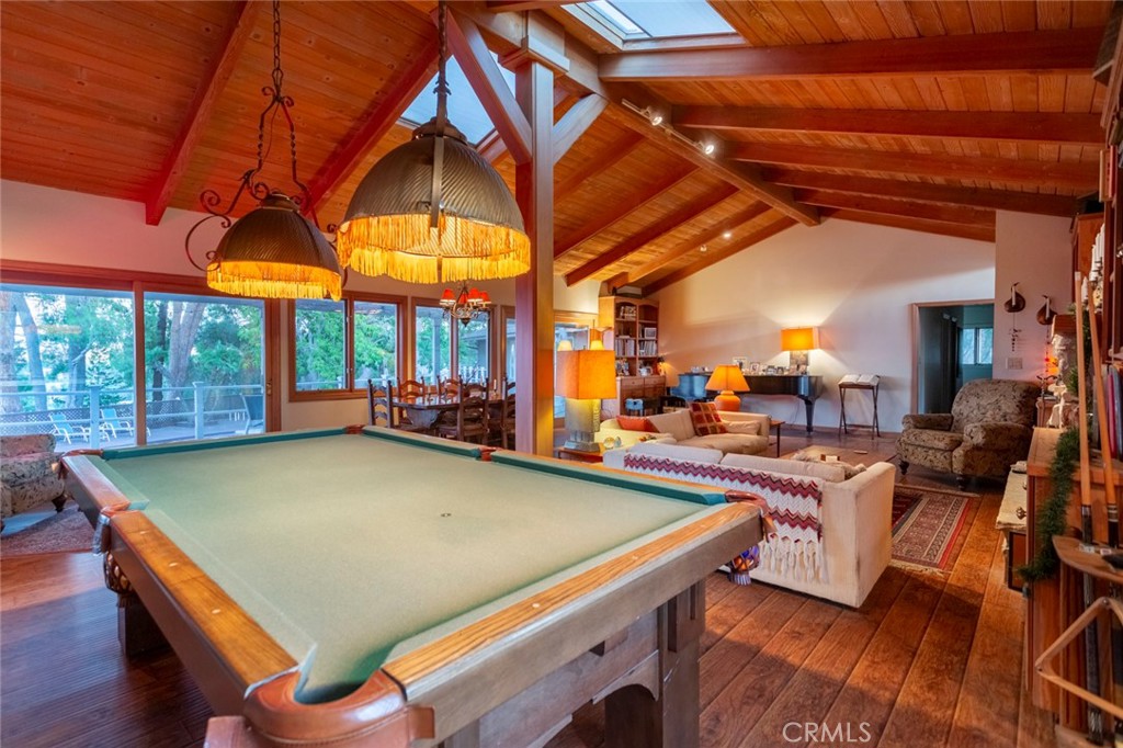 5798 Penland Road Hidden Hills, CA 91302 - Photo 5 of 13 a view of a patio with swimming pool table and chairs