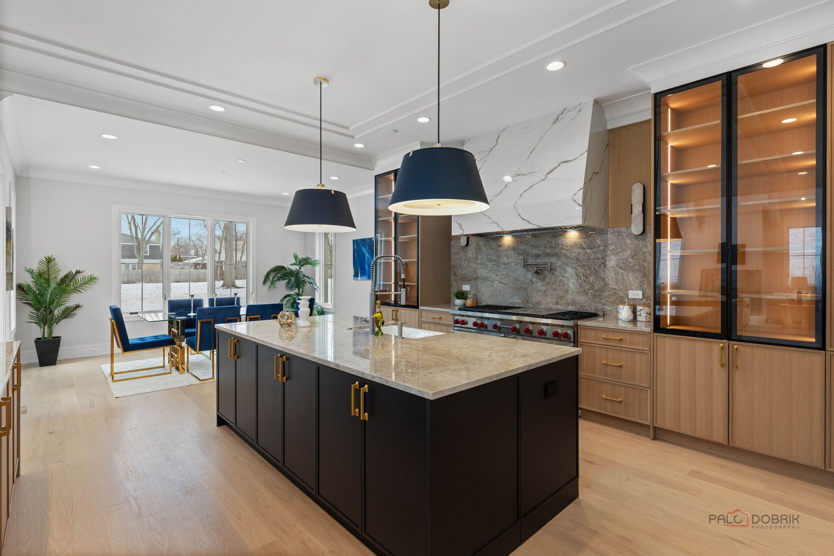 3890 Greenacre Drive Northbrook, IL 60062 - Photo 13 of 37 a kitchen with stainless steel appliances granite countertop a sink a stove and a wooden floors