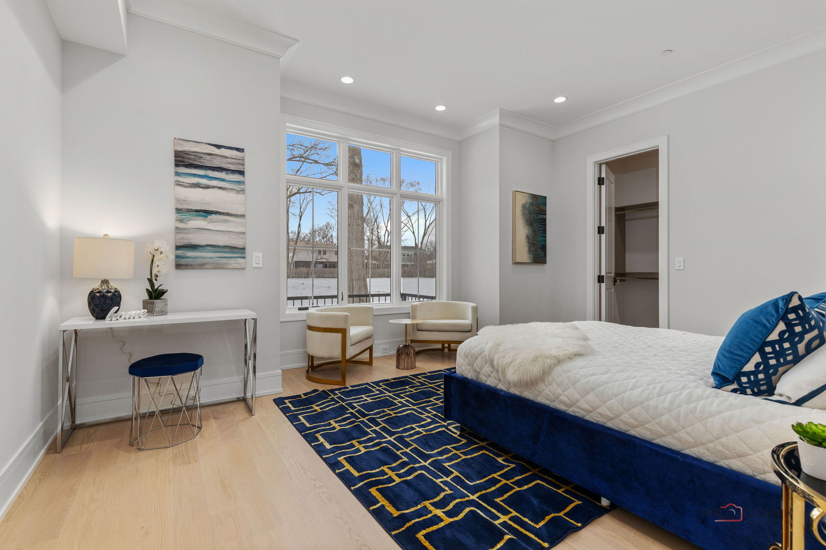 3890 Greenacre Drive Northbrook, IL 60062 - Photo 17 of 37 a bedroom with a bed and a table