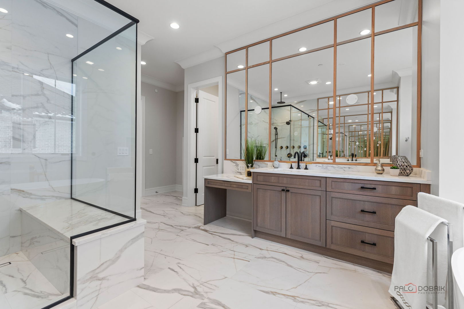 3890 Greenacre Drive Northbrook, IL 60062 - Photo 24 of 37 a bathroom with a double vanity sink mirror and shower