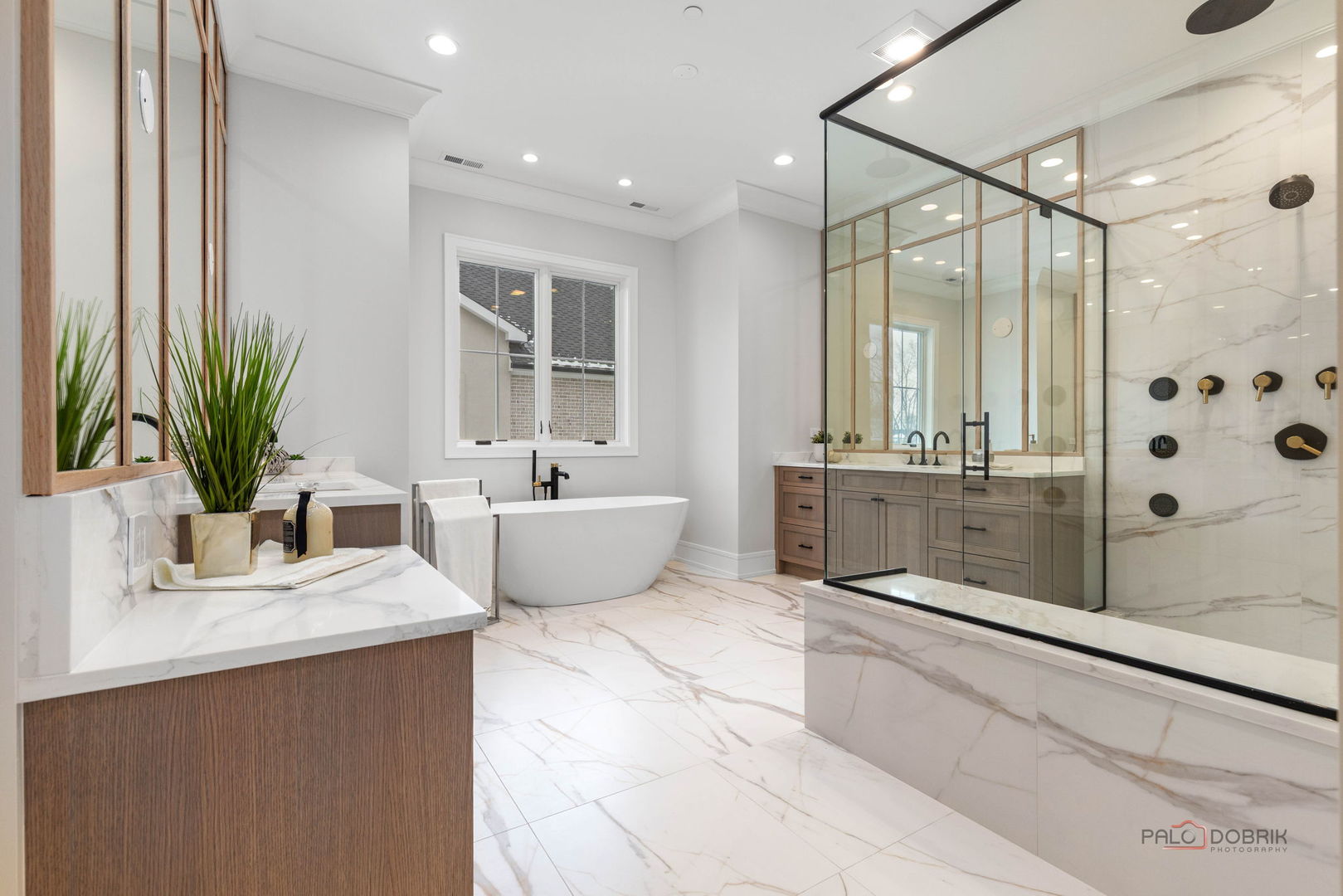 3890 Greenacre Drive Northbrook, IL 60062 - Photo 25 of 37 a spacious bathroom with a double vanity sink a large mirror and shower