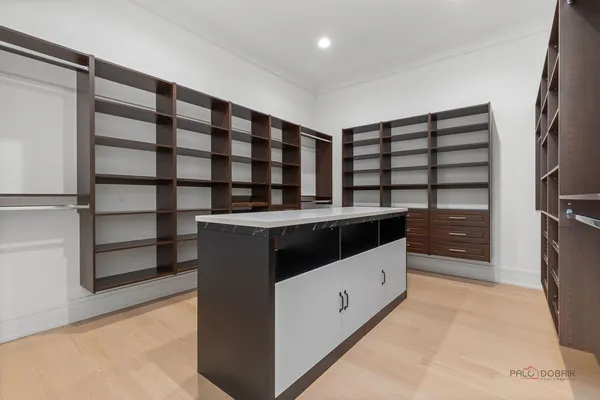 a kitchen with a cabinets and a stove