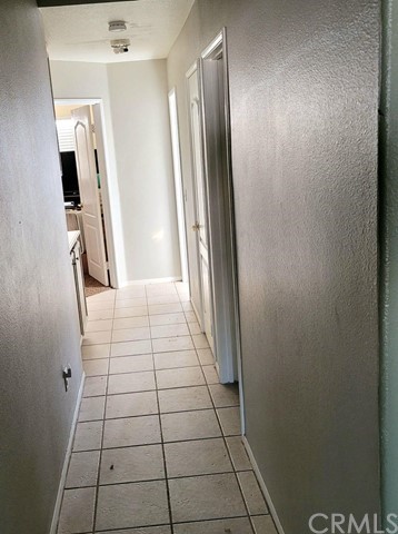 12915 Lompoc Road Apple Valley, CA 92308 - Photo 6 of 23 a view of a hallway