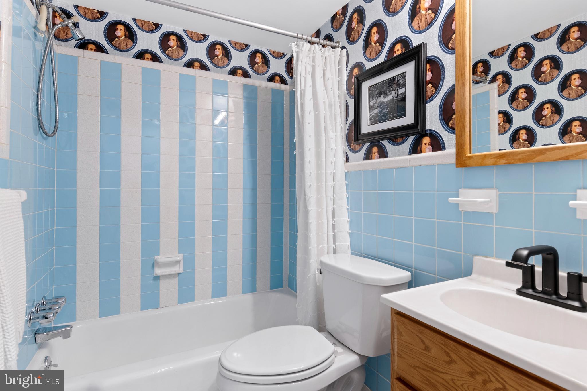 1714 Addison Street Philadelphia, PA 19146 - Photo 24 of 58 Old school blue tile bath with Ben Franklin