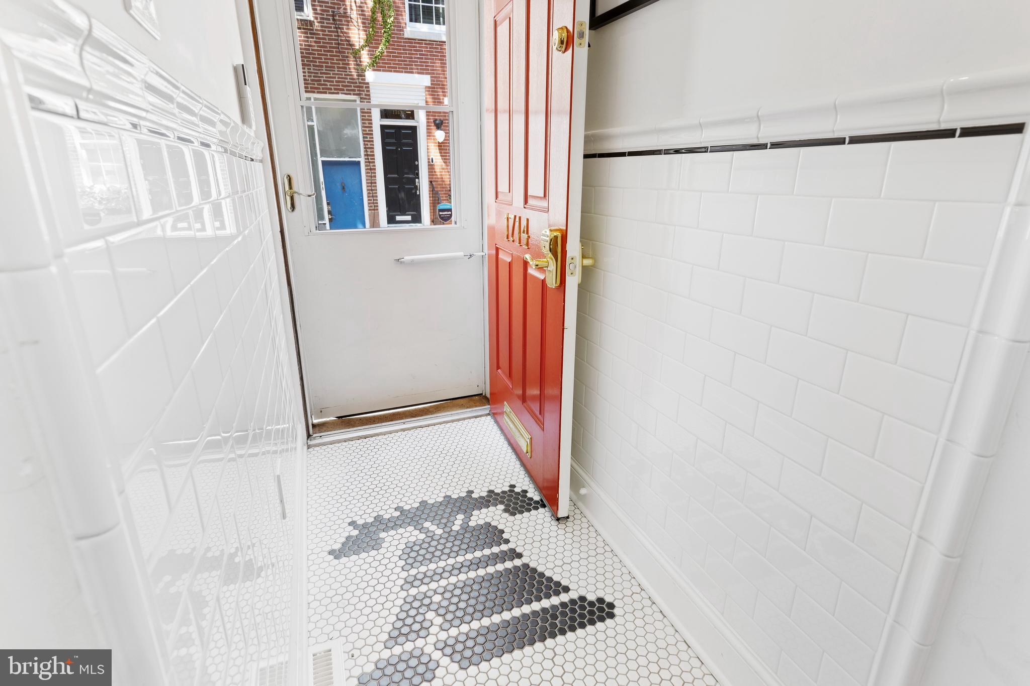 1714 Addison Street Philadelphia, PA 19146 - Photo 4 of 58 Liberty Bell hex tile entryway