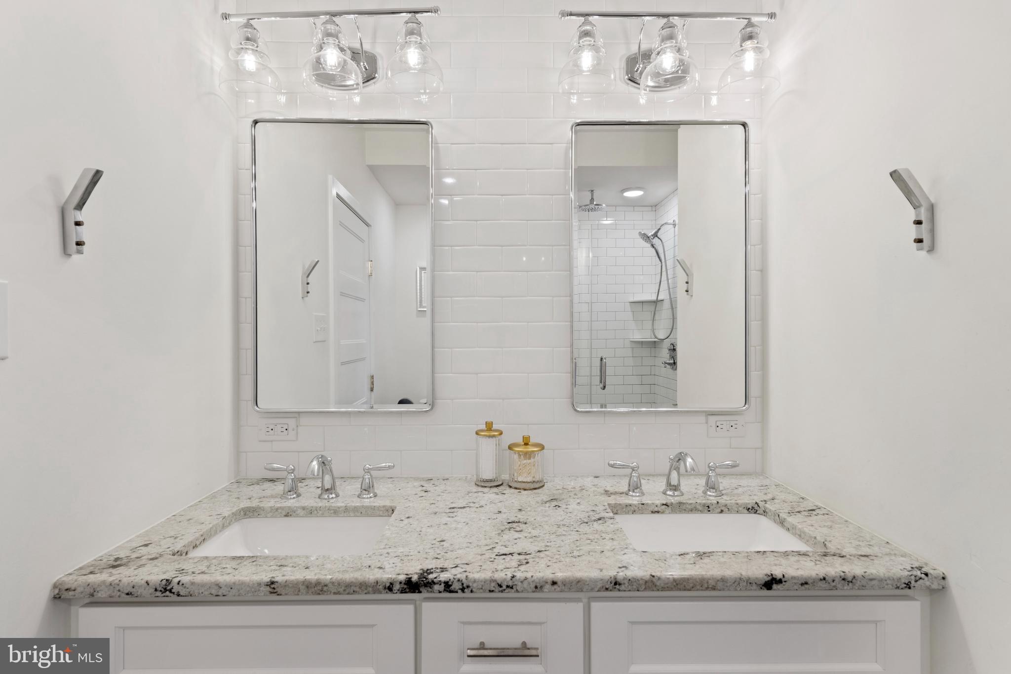 1714 Addison Street Philadelphia, PA 19146 - Photo 42 of 58 Deep custom vanities, recessed medicine cabinets