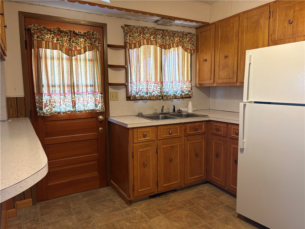 385 Imperial Avenue Erwin, NY 14870 - Photo 15 of 36 Kitchen leads to side porch