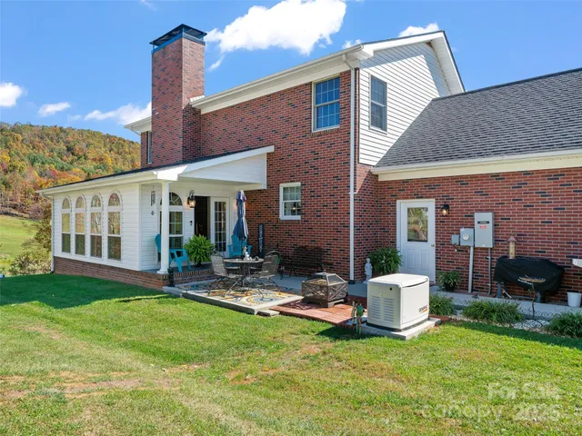 a house view with sitting space and garden space
