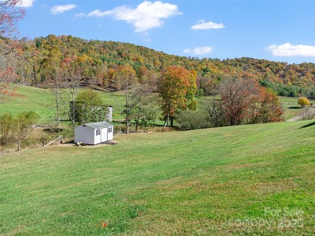 a view of a building with a yard