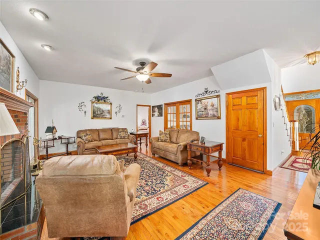 a living room with furniture and a table