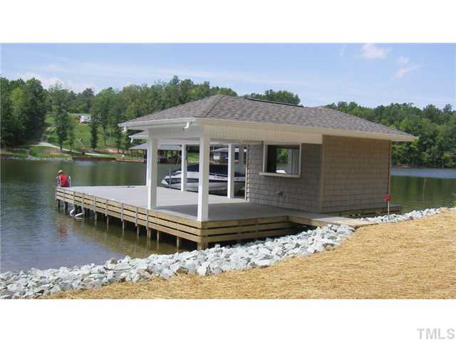 818 Big Dipper Drive Semora, NC 27343 - Photo 4 of 22 Single slip boathouse with trex and bar area