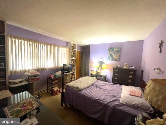 2146 Fairview Avenue Reading, PA 19606 - Photo 21 of 25 a bedroom with a bed and wooden floor