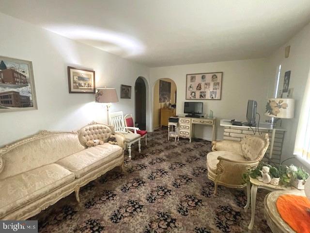 2146 Fairview Avenue Reading, PA 19606 - Photo 6 of 25 a living room with furniture and a fireplace