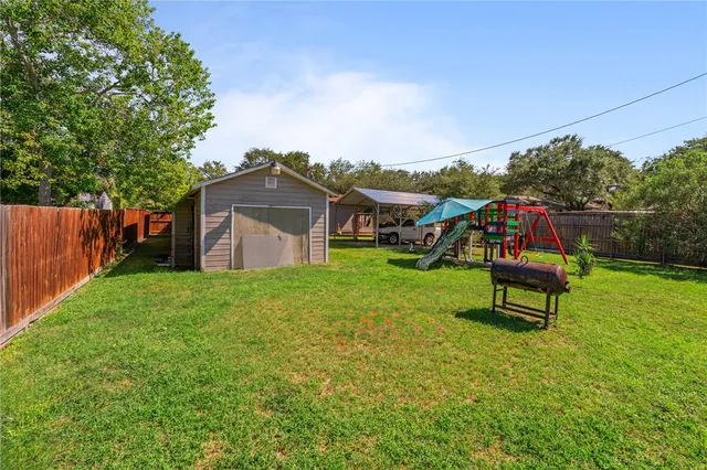 a house view with a garden space