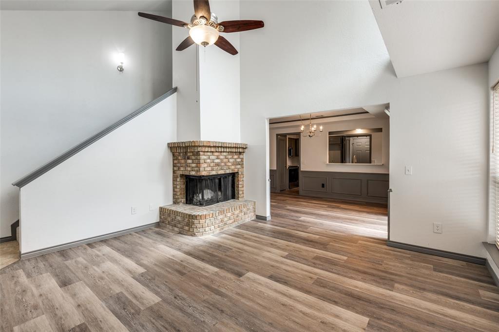 17079 Upper Bay Road Addison, TX 75001 - Photo 11 of 24 a view of a livingroom with a fireplace