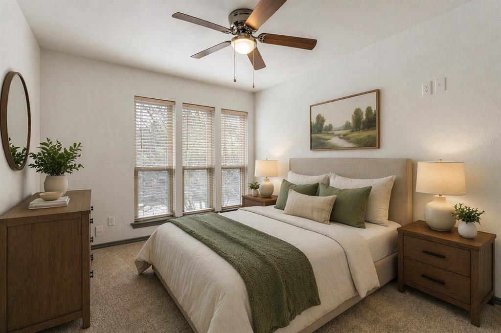 17079 Upper Bay Road Addison, TX 75001 - Photo 15 of 24 a bedroom with a balcony a bed and a chandelier