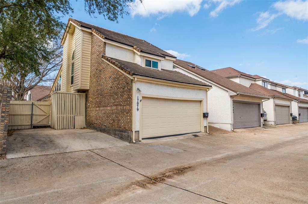 17079 Upper Bay Road Addison, TX 75001 - Photo 19 of 24 a view of a house with a garage