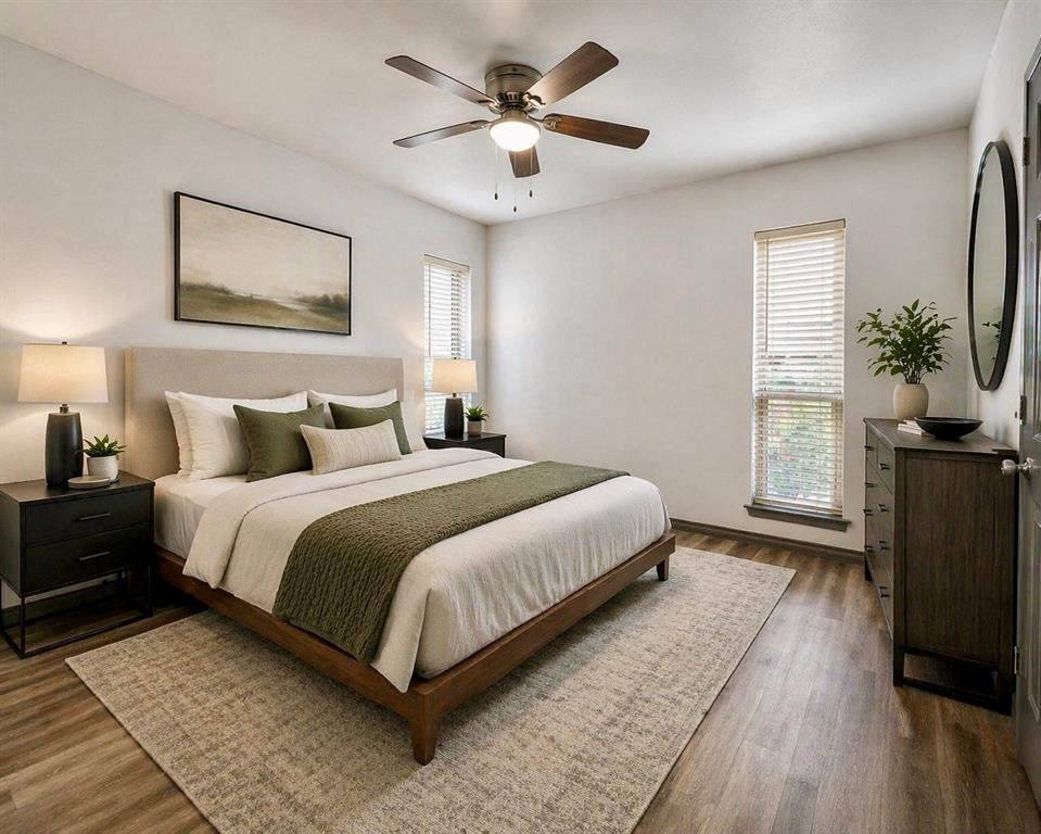17079 Upper Bay Road Addison, TX 75001 - Photo 10 of 24 a bedroom with a large bed a chandelier and a window