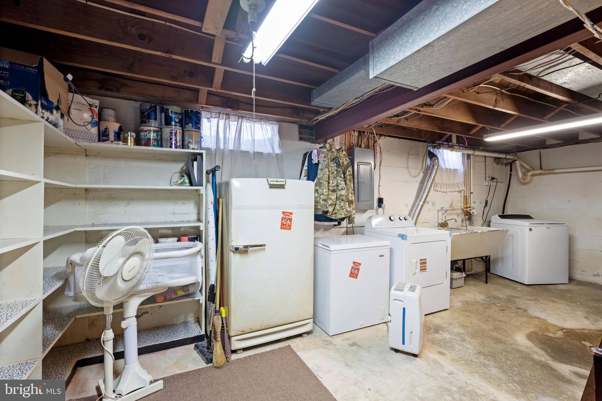 4207 Ralph Avenue Hampstead, MD 21074 - Photo 24 of 33 a room with storage and utility