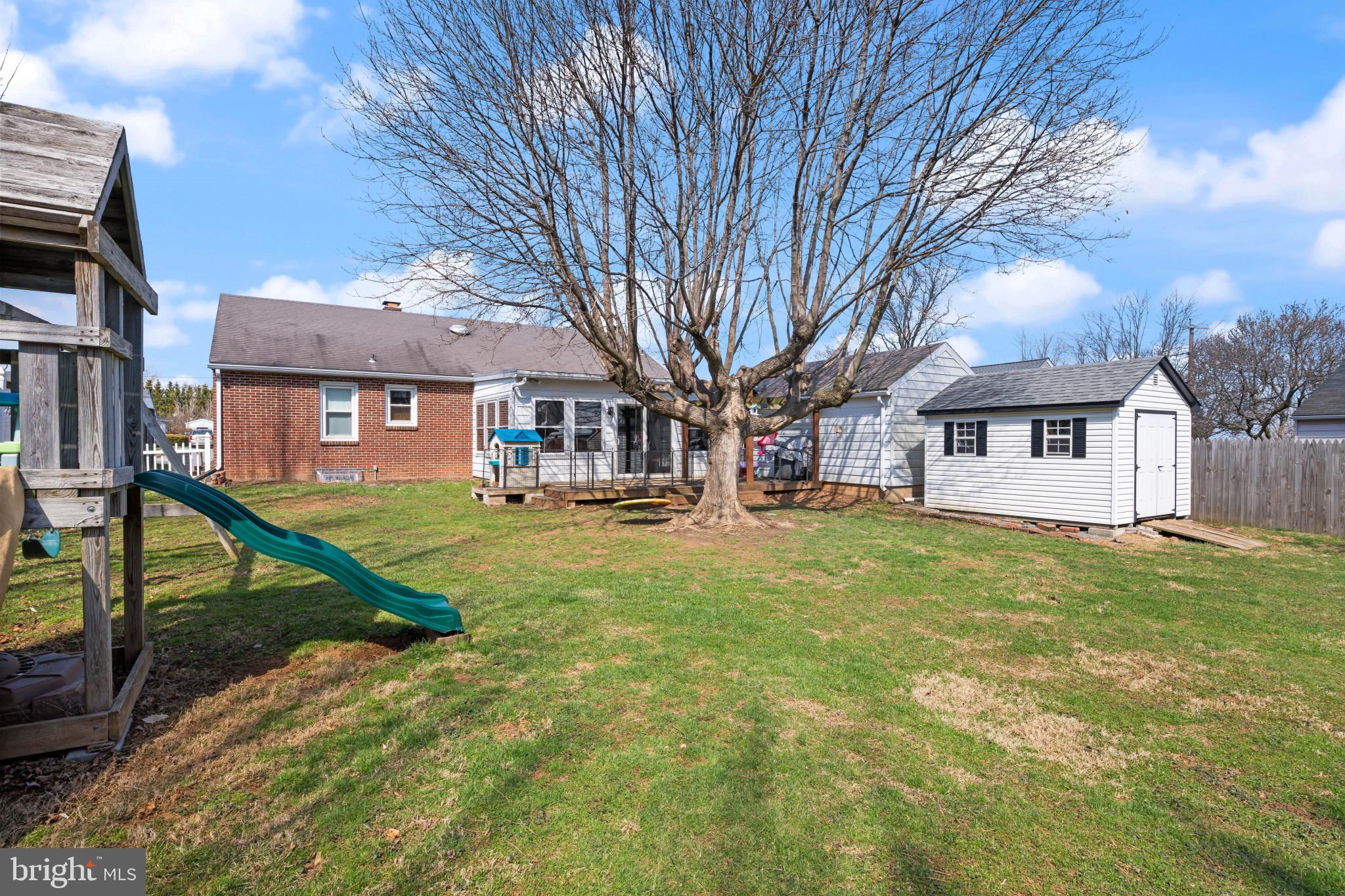 4207 Ralph Avenue Hampstead, MD 21074 - Photo 29 of 33 a front view of a house with a yard