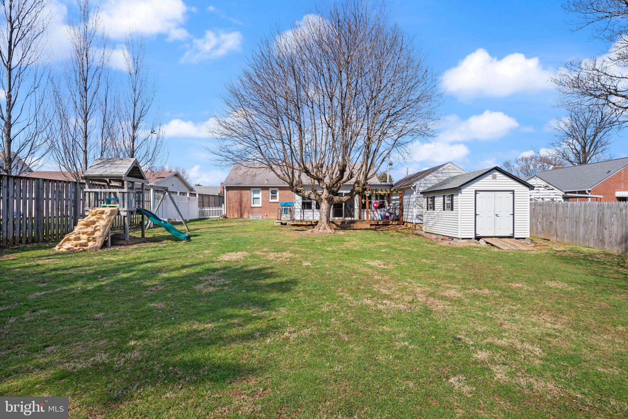 4207 Ralph Avenue Hampstead, MD 21074 - Photo 30 of 33 a view of a house with a backyard