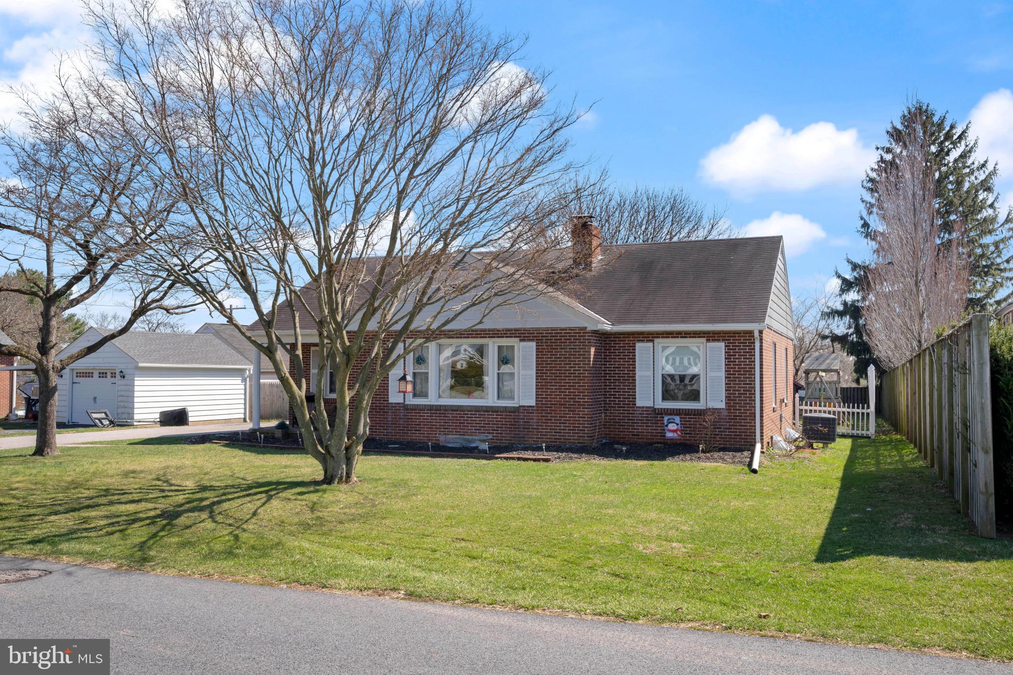 4207 Ralph Avenue Hampstead, MD 21074 - Photo 3 of 33 a front view of house with yard and green space