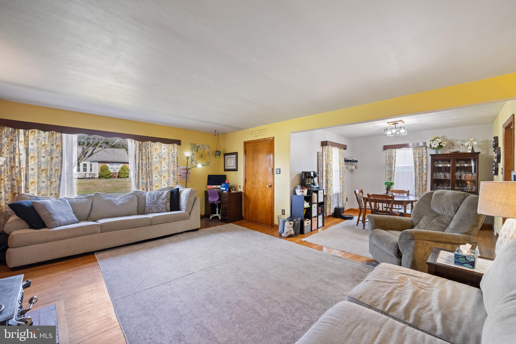 4207 Ralph Avenue Hampstead, MD 21074 - Photo 4 of 33 a living room with furniture and a large window