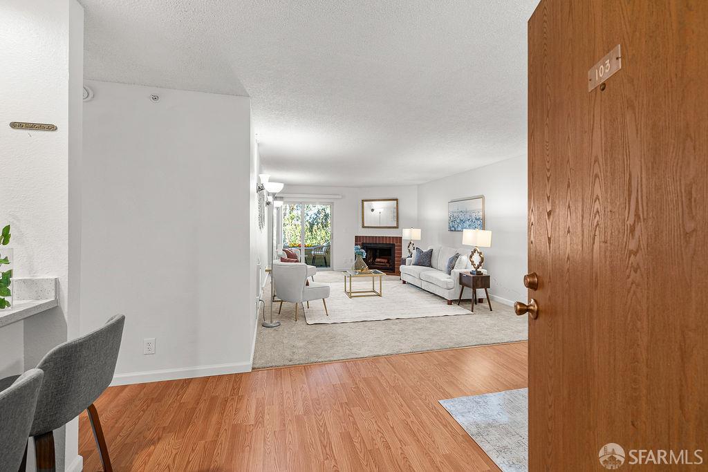 332 Philip Drive, Unit 103 Daly City, CA 94015 - Photo 1 of 37 a living room with furniture and a table