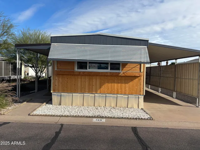 a house view with a backyard space