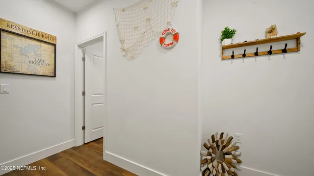 a view of a swimming pool with chairs in patio