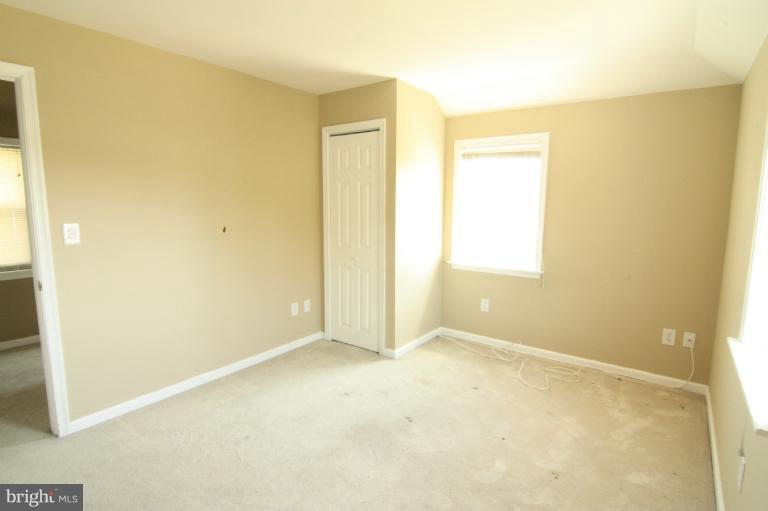 703 Dorchester Road Baltimore, MD 21229 - Photo 13 of 27 a view of an empty room