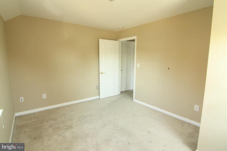 703 Dorchester Road Baltimore, MD 21229 - Photo 23 of 27 a view of an empty room