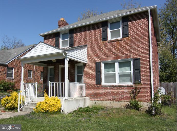 703 Dorchester Road Baltimore, MD 21229 - Photo 27 of 27 front view of a house with a yard
