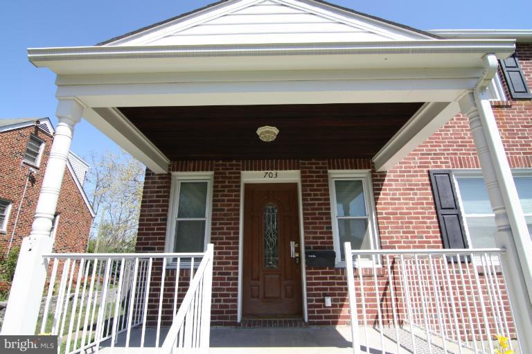 703 Dorchester Road Baltimore, MD 21229 - Photo 5 of 27 a view of a house with a window
