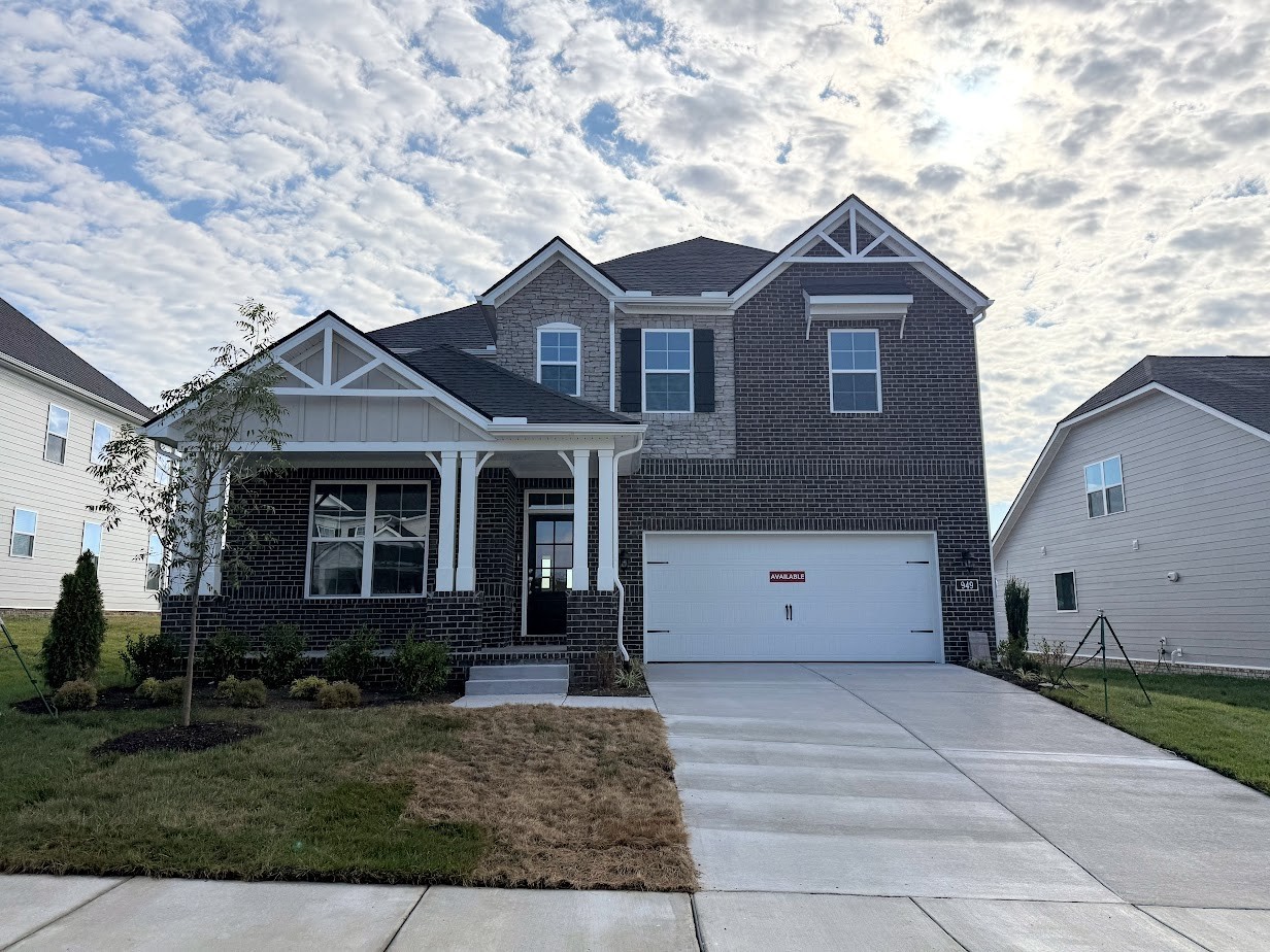 949 Pleasant Ridge Run Mount Juliet, TN 37122 - Photo 1 of 61 a front view of a house with a yard