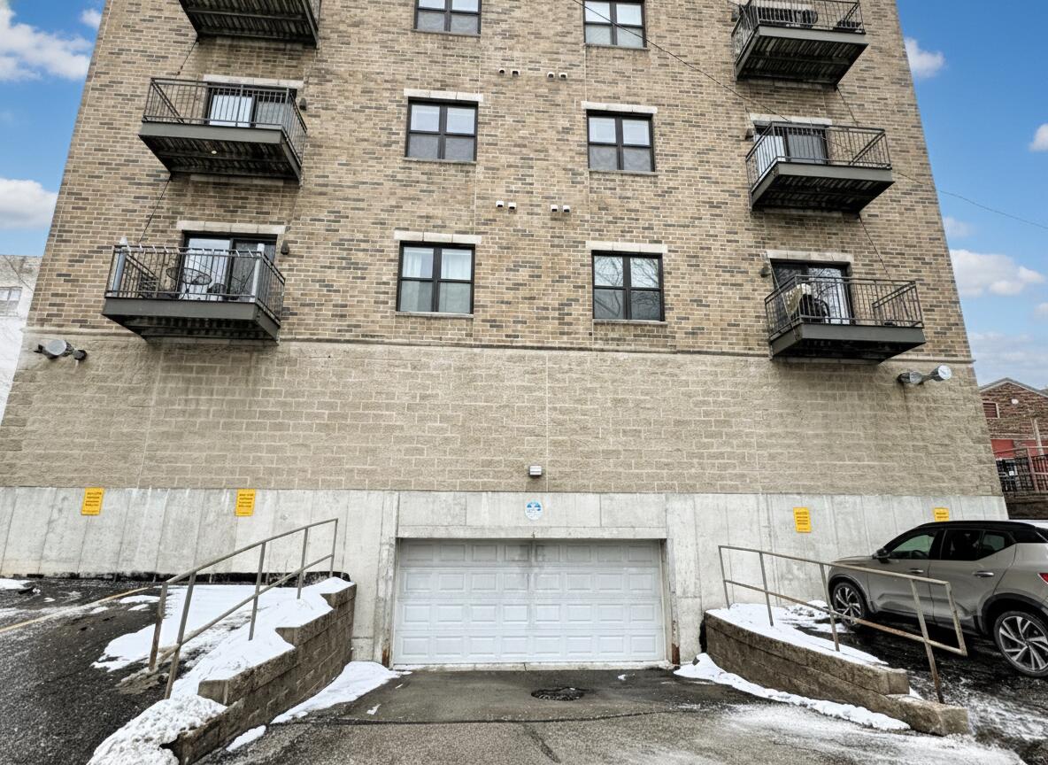 1812 East Lafayette Place, Unit 405 Milwaukee, WI 53202 - Photo 25 of 30 Parking Garage Entrance