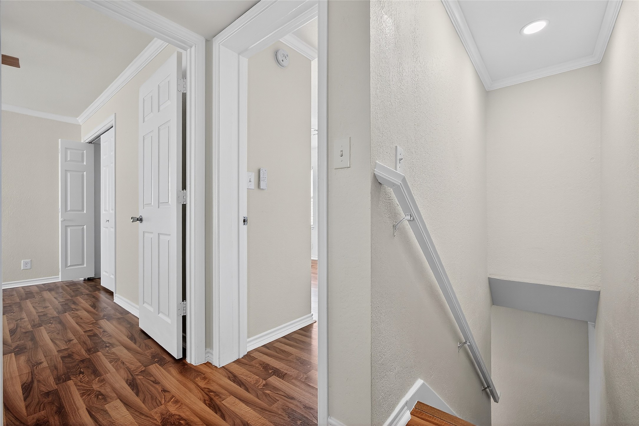 1221 Cedar Post Lane, Unit 1B Houston, TX 77055 - Photo 13 of 23 a view of a hallway with wooden floor and entryway