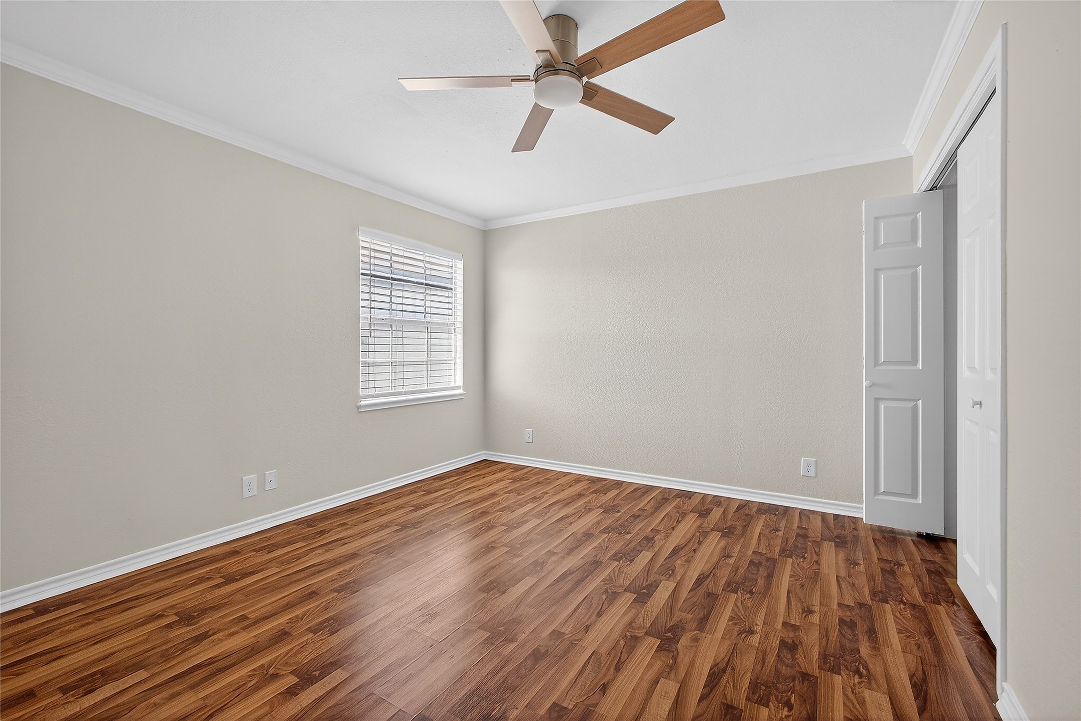 1221 Cedar Post Lane, Unit 1B Houston, TX 77055 - Photo 19 of 23 a view of an empty room with wooden floor and a window