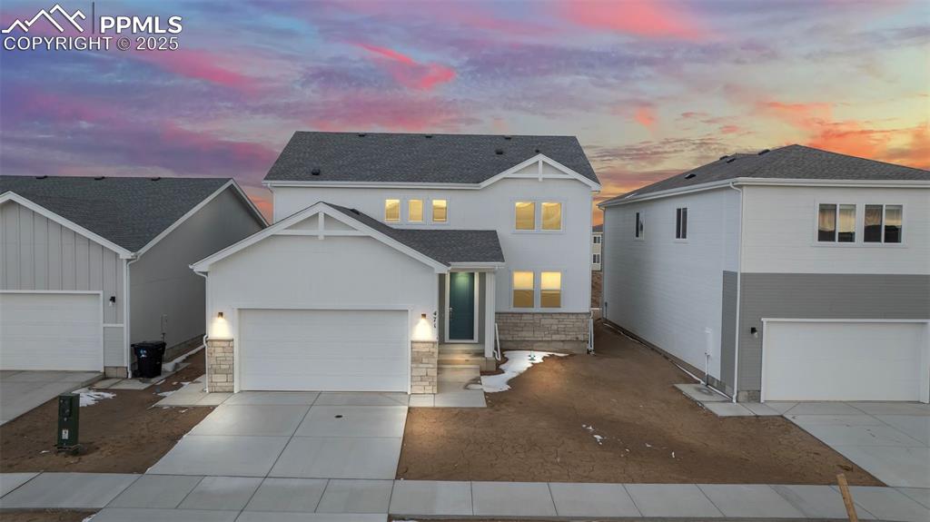 a view of a house with a backyard