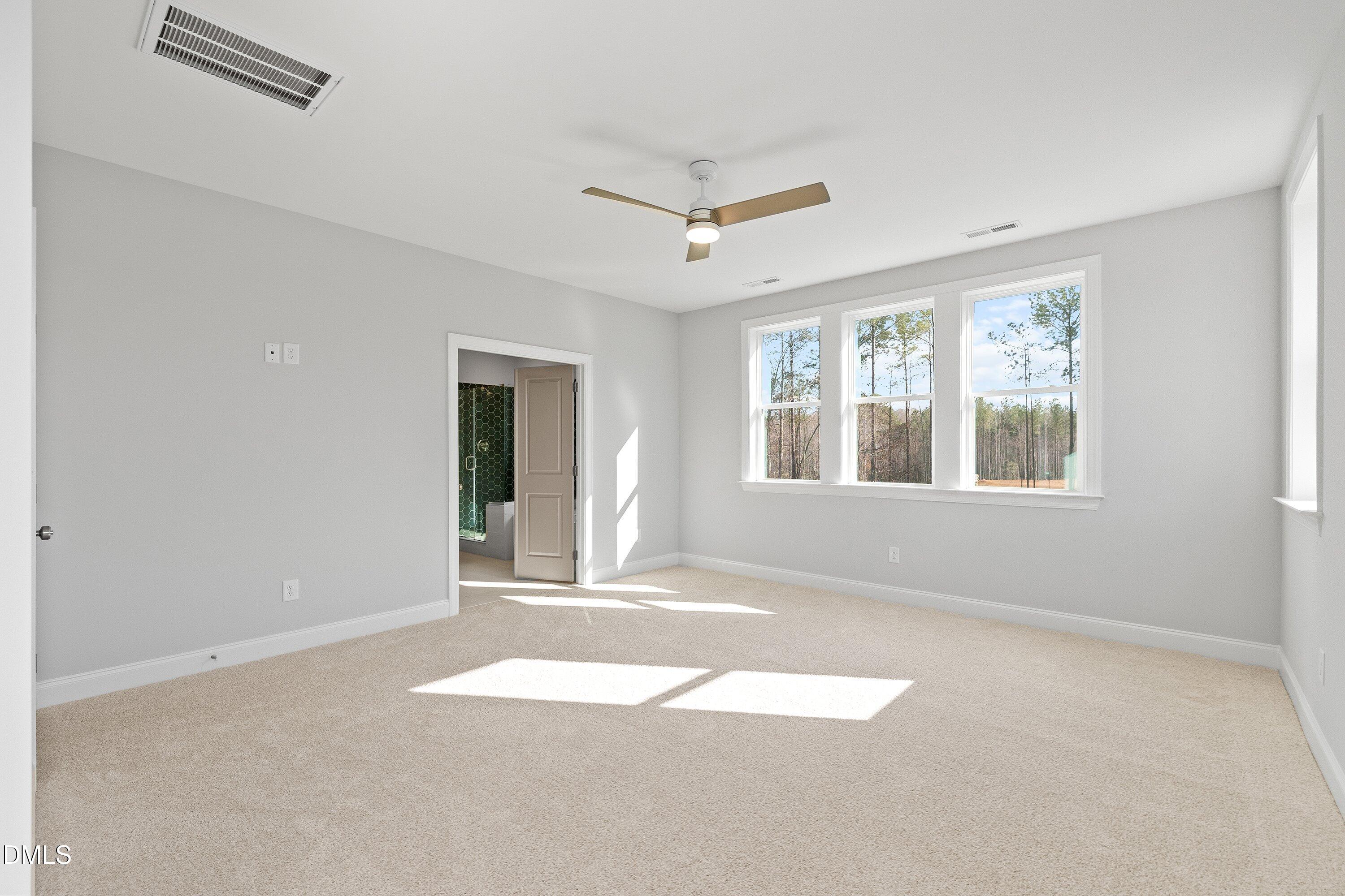 45 West Victoria Ridge Drive, Unit 32 Selma, NC 27576 - Photo 18 of 27 Upstairs primary bedroom