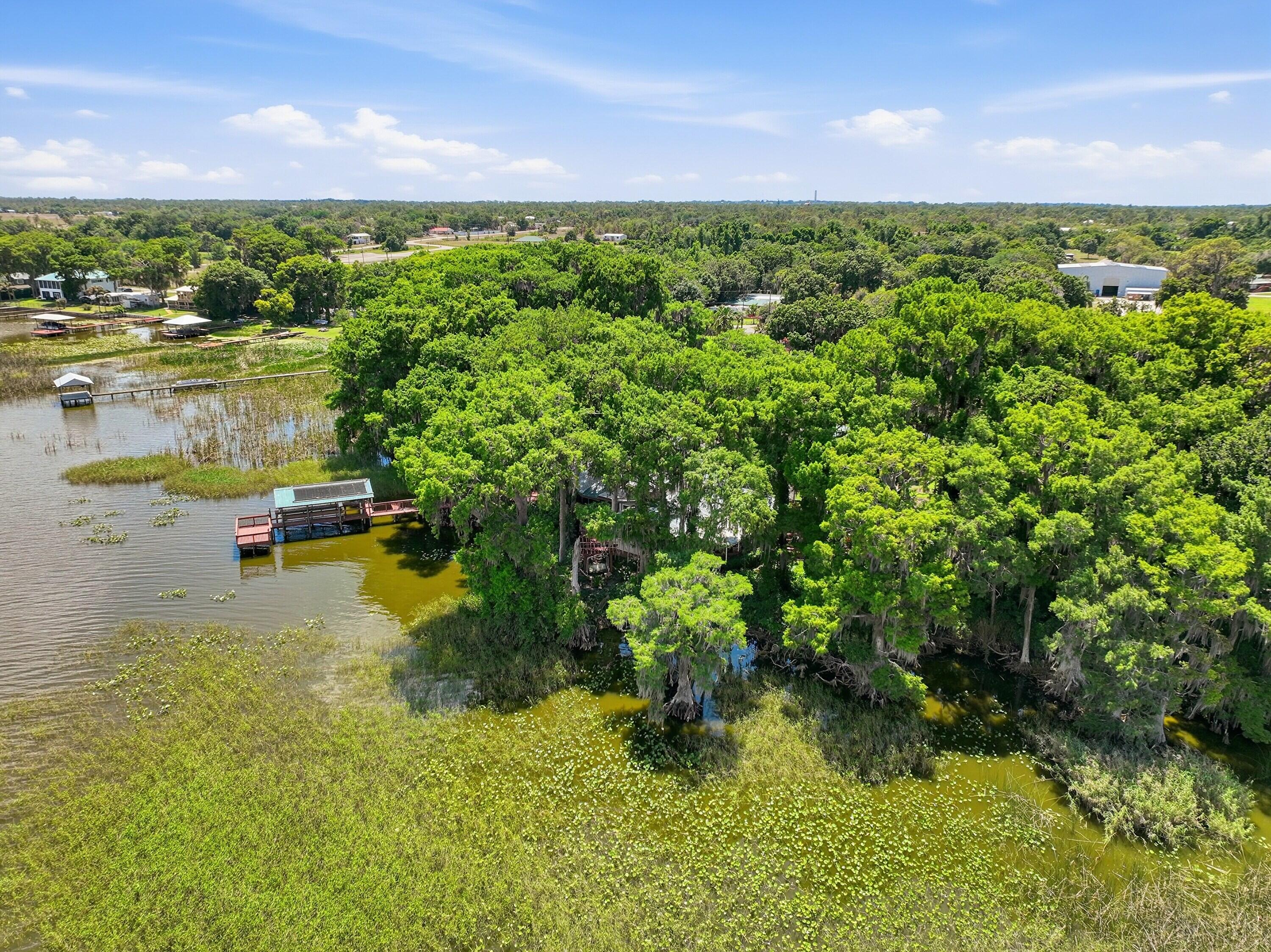 200 Windy Point Road Lake Placid, FL 33852 - Photo 67 of 74 a view of an outdoor space and a lake view