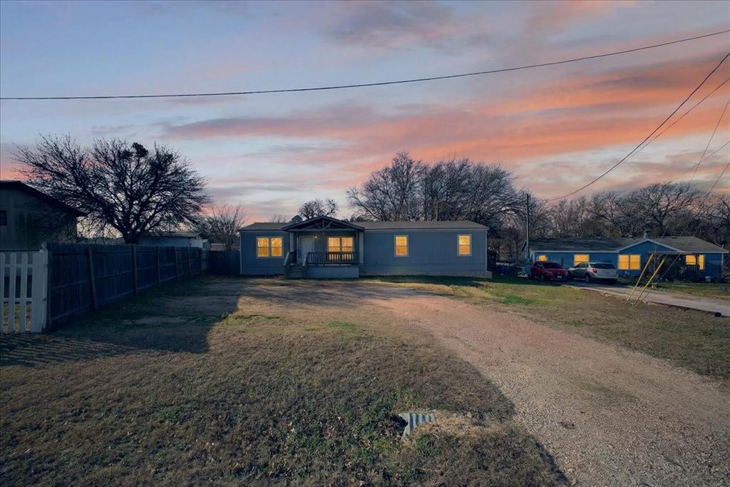 3605 Mockingbird Circle Cleburne, TX 76031 - Photo 2 of 40 View of front of house with dirt driveway
