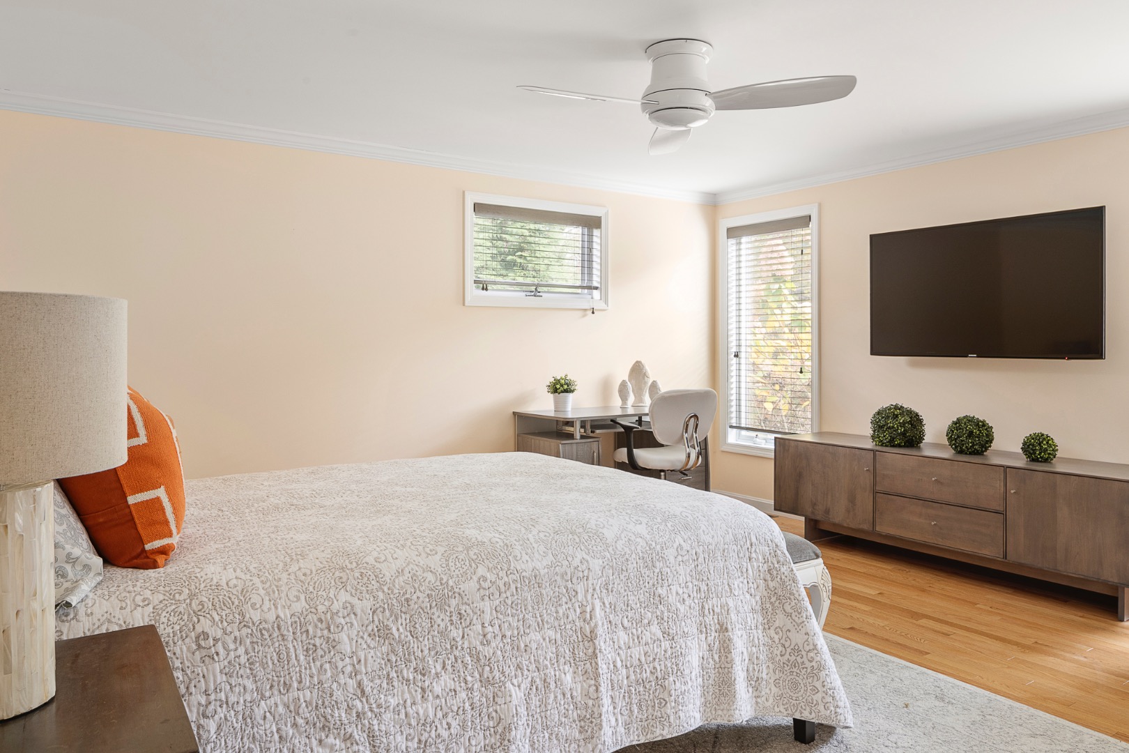 87 Schoolhouse Road Edgartown, MA 02539 - Photo 11 of 29 a bedroom with a bed and flat screen tv
