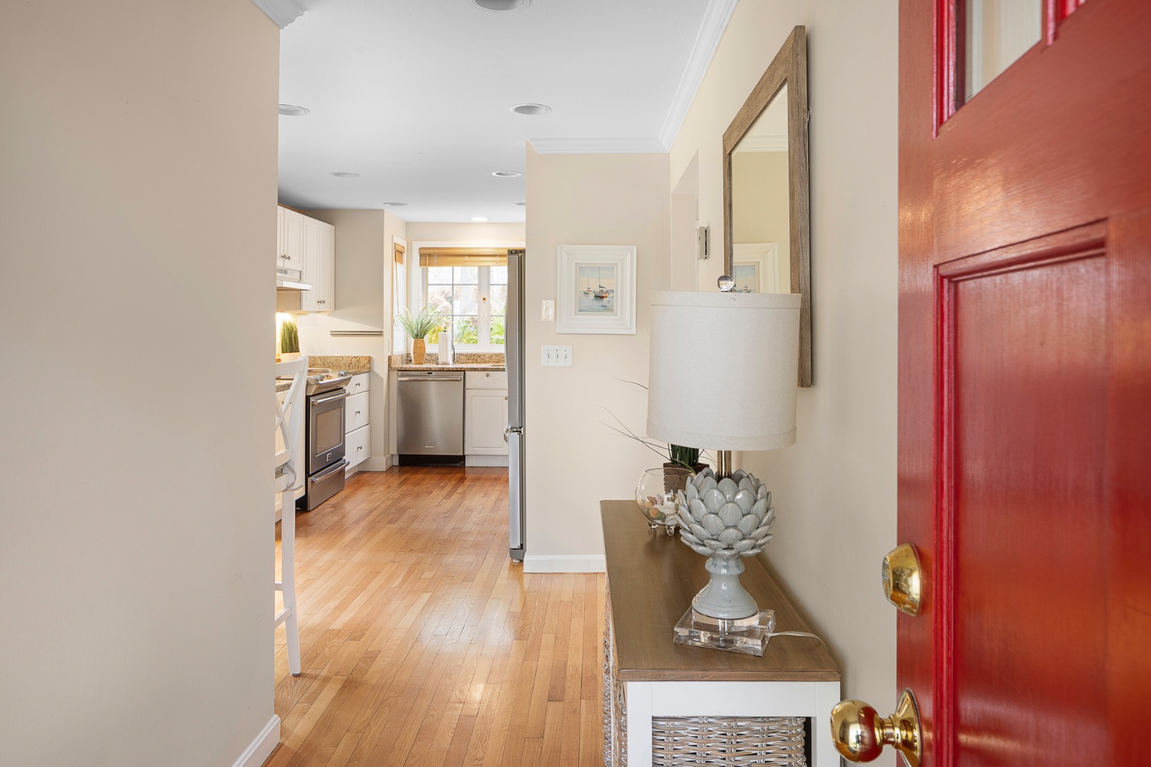 87 Schoolhouse Road Edgartown, MA 02539 - Photo 6 of 29 a kitchen with a refrigerator and a stove