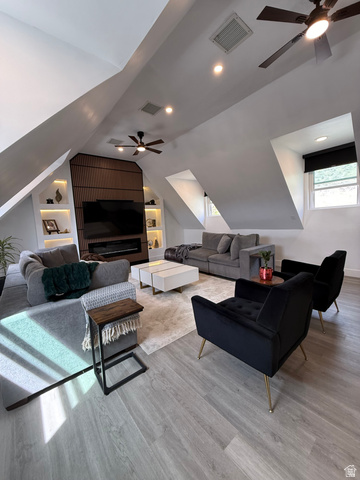 965 North 800 East Springville, UT 84663 - Photo 21 of 46 Living room featuring ceiling fan, light wood finished floors, and vaulted ceiling