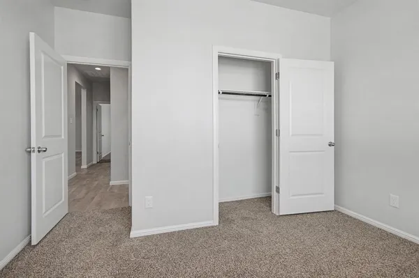 an empty room with closet