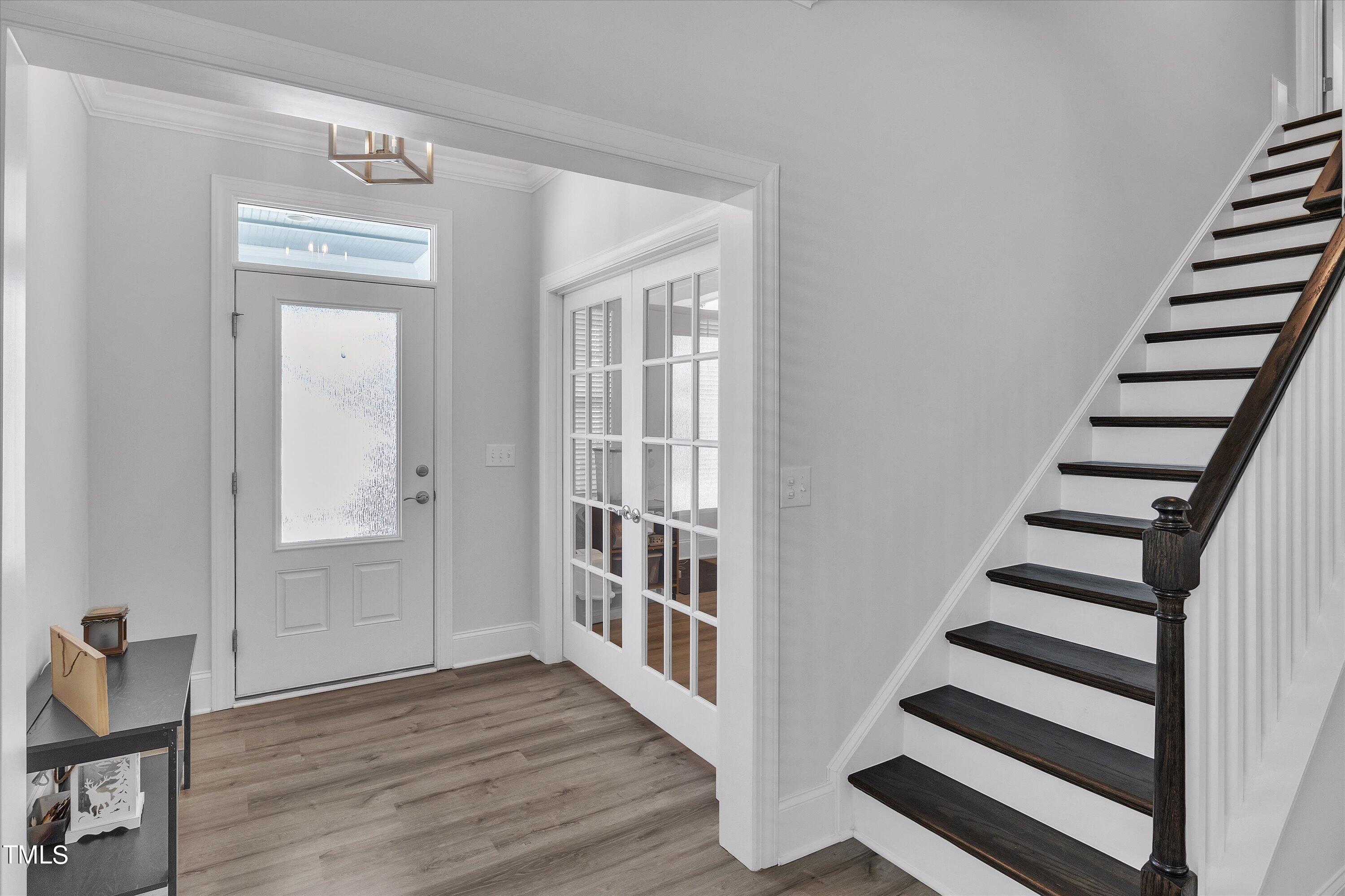 2901 Thurman Dairy Loop Wake Forest, NC 27587 - Photo 14 of 28 a view of a hallway with wooden floor and windows