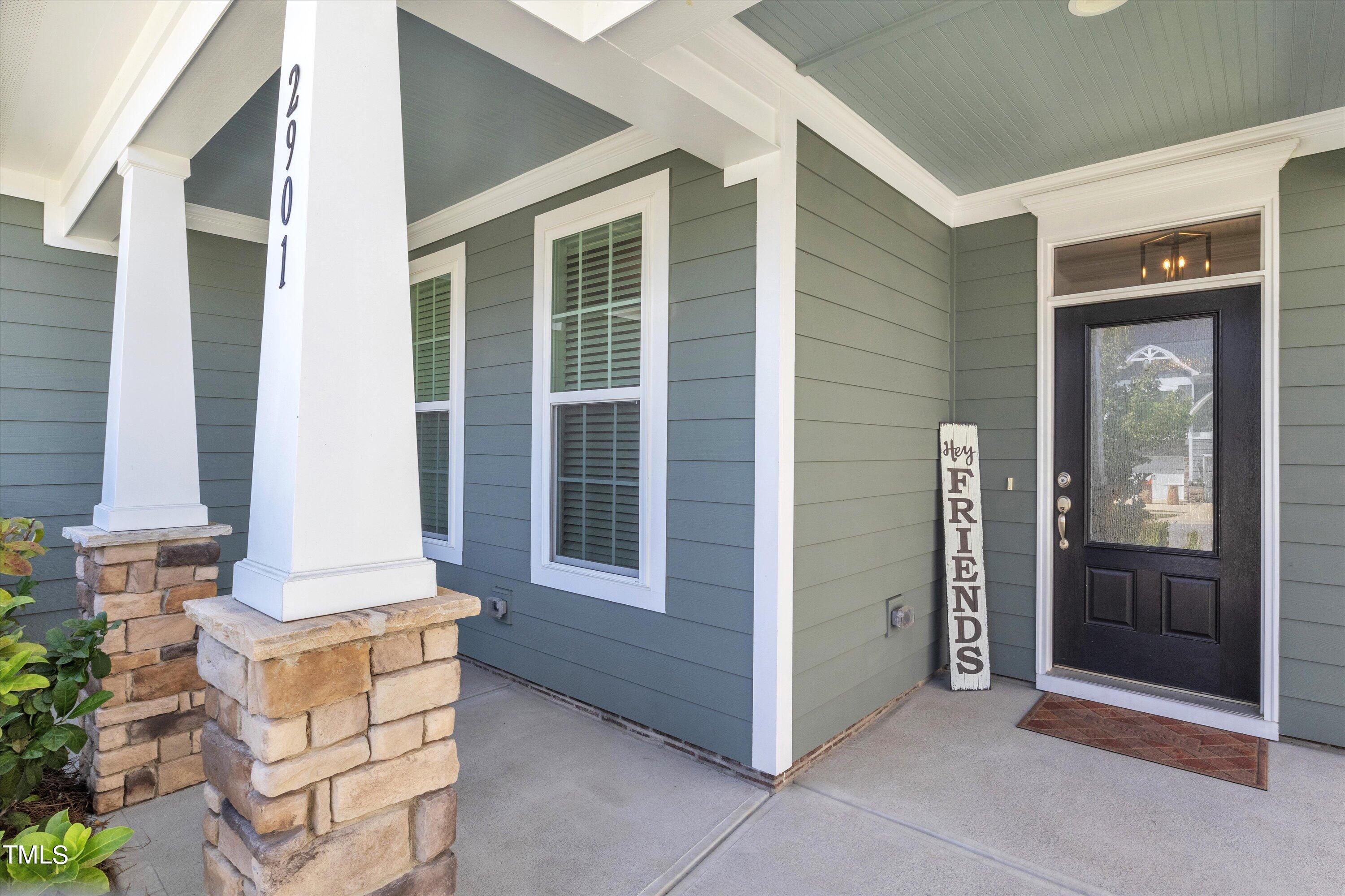 2901 Thurman Dairy Loop Wake Forest, NC 27587 - Photo 4 of 28 front view of house with large windows