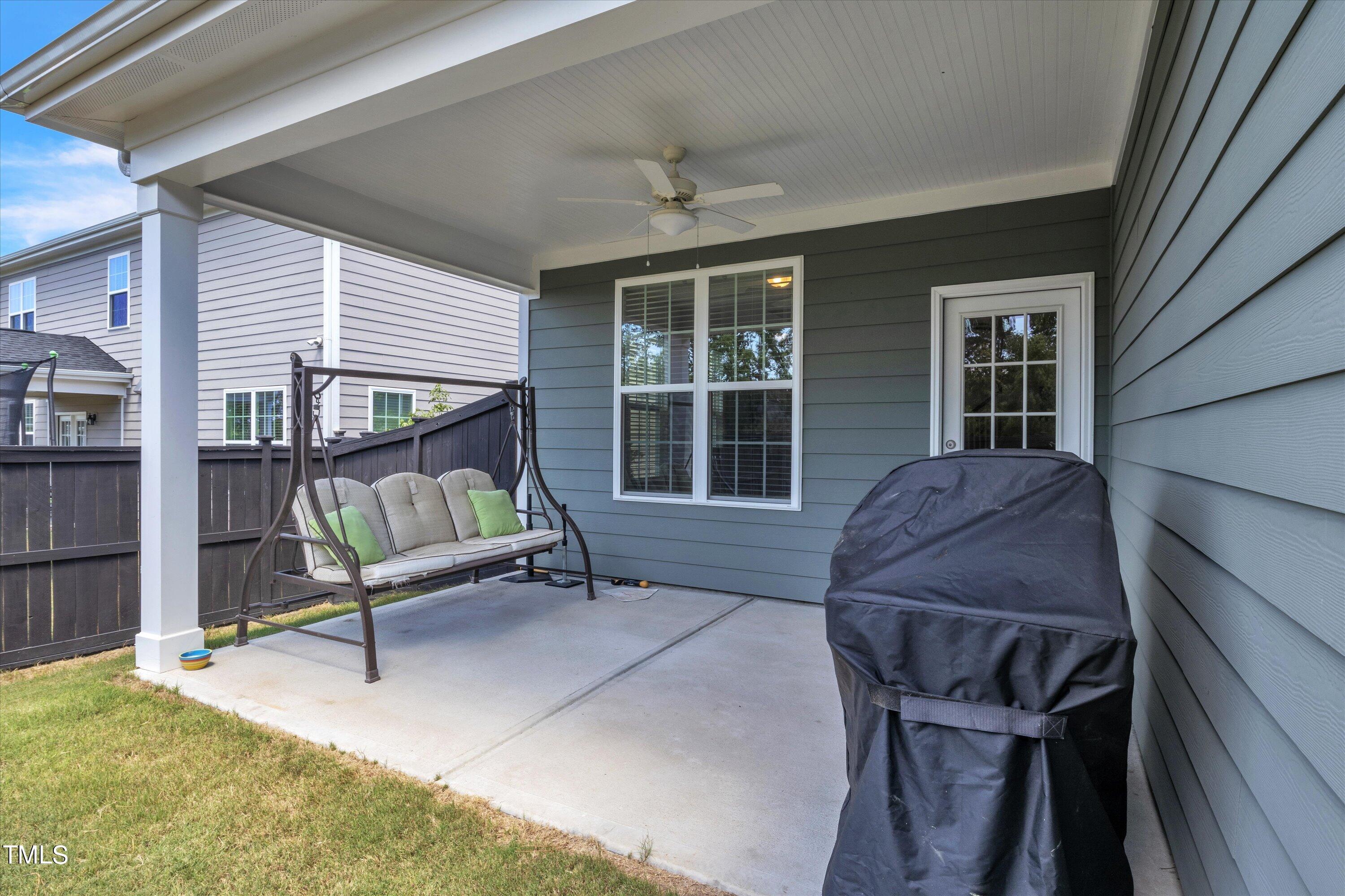 2901 Thurman Dairy Loop Wake Forest, NC 27587 - Photo 5 of 28 a balcony with furniture and large window